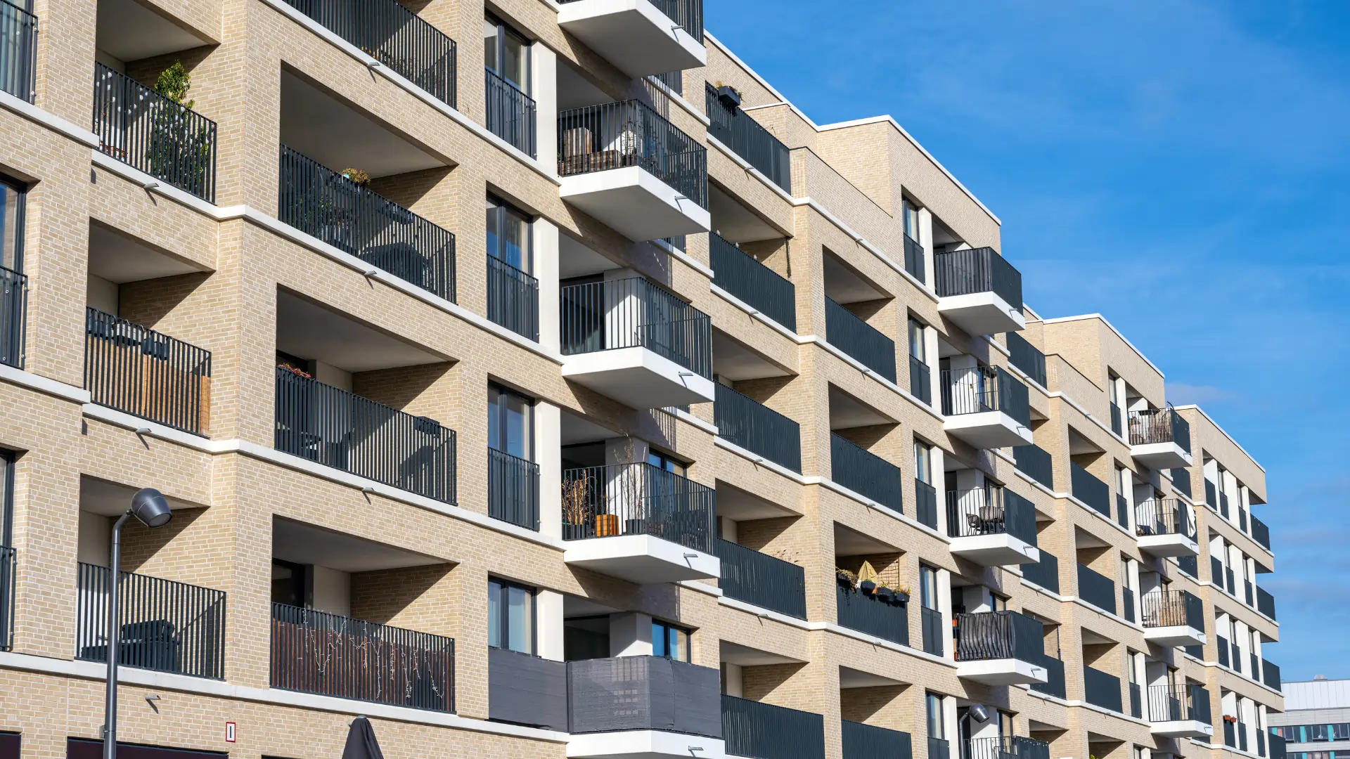 New apartment buildings in a housing development, representing apartment turnover services.