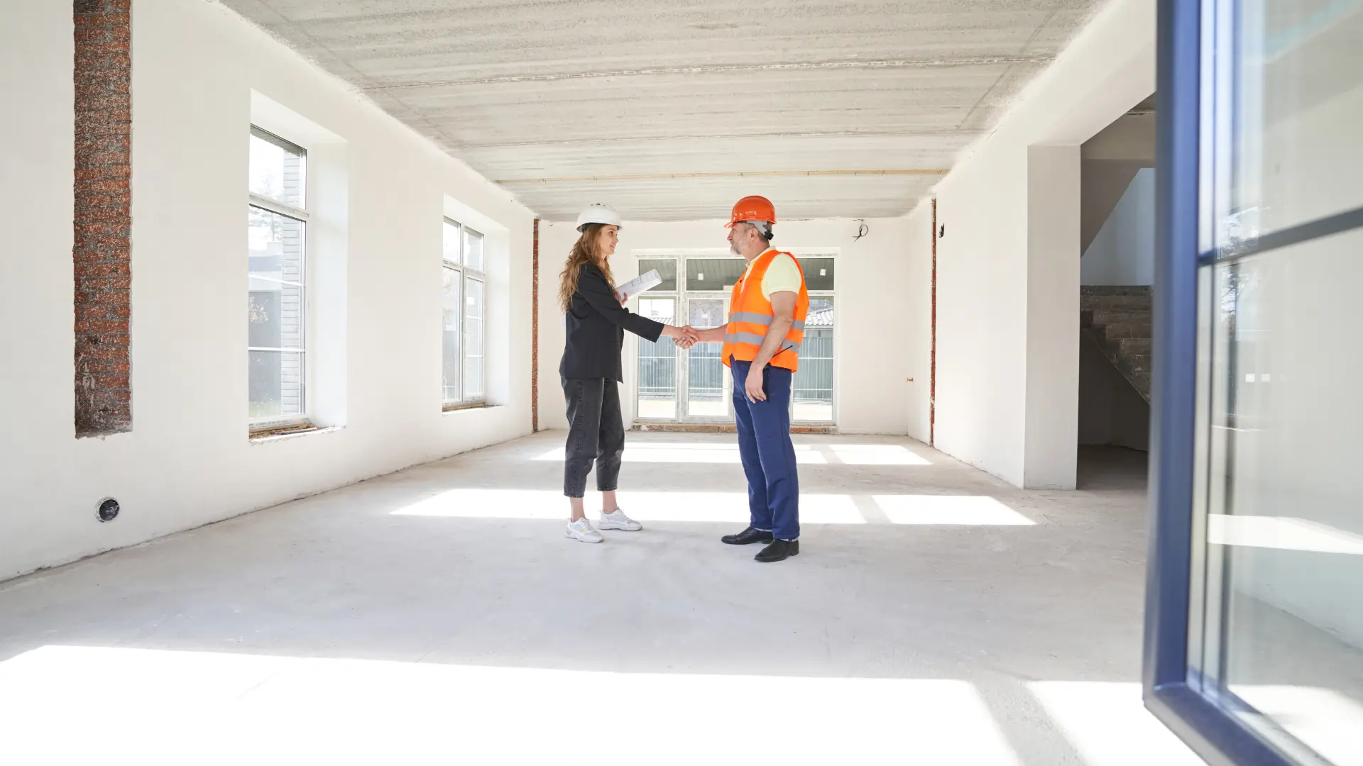 Section 8 inspector and property manager reviewing a unit during HUD inspection process