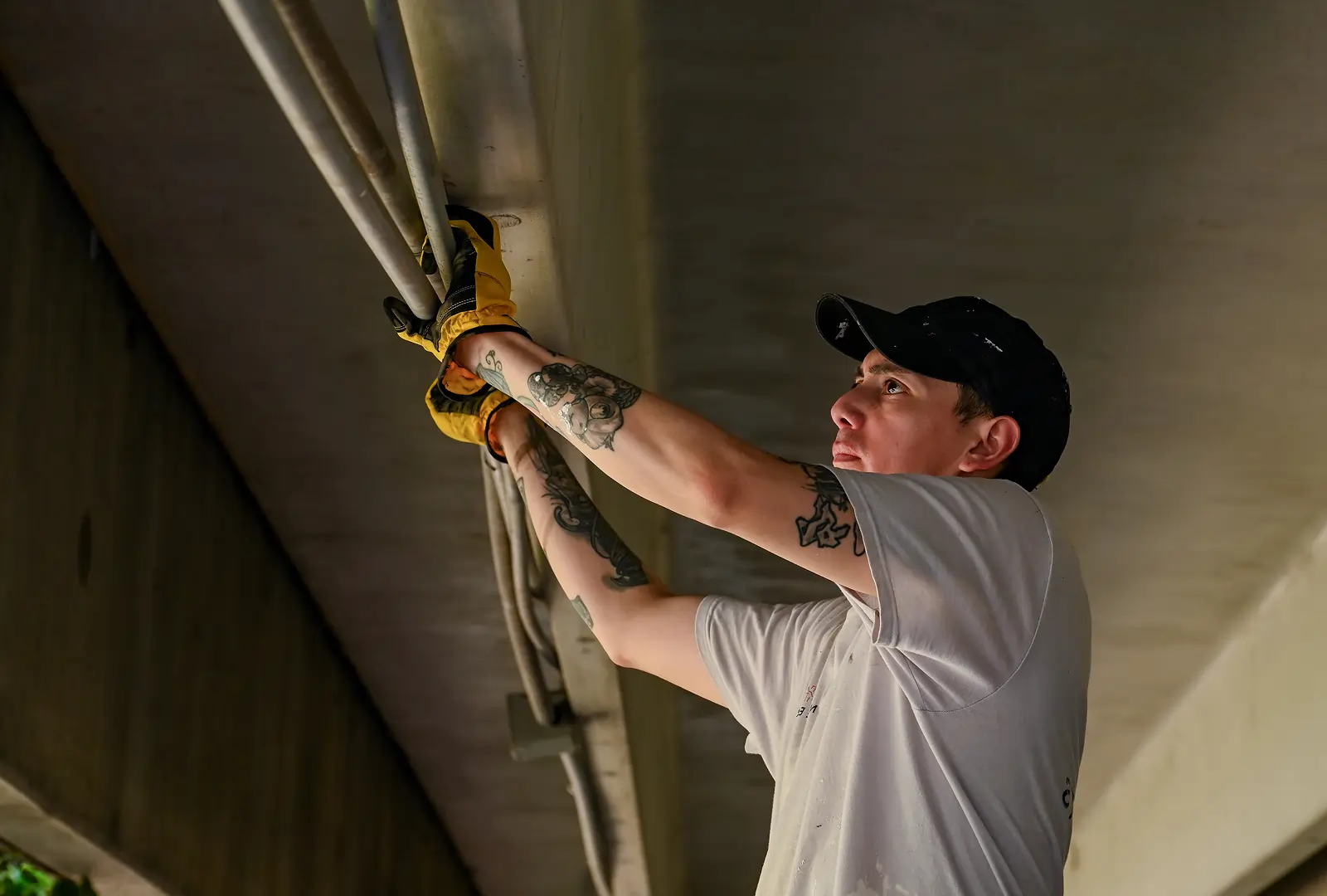 Technician performing apartment maintenance staffing repairs for multifamily property