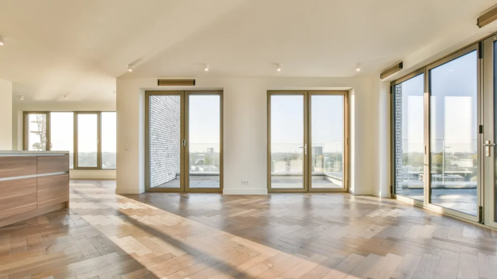 Bright apartment interior featuring HUD Window Requirements with clear weatherproofing