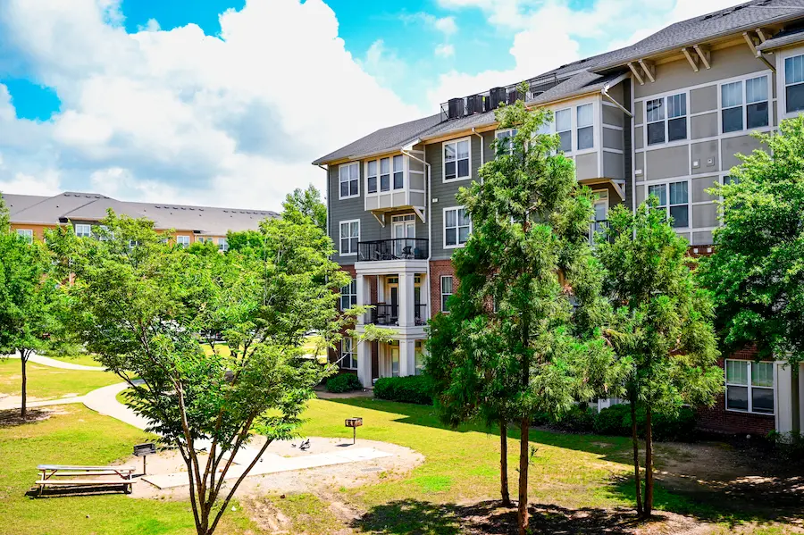 b4a76ac1c36f1ef9a42c399b13a05c6592544b9f Technician performing NSPIRE pre inspection on kitchen appliances for HUD compliance