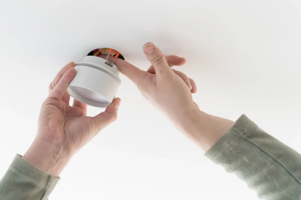 Installing smoke detector to meet HUD requirements and NSPIRE inspection standards