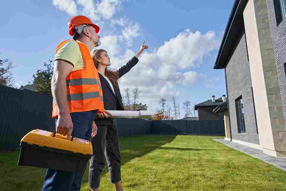 Inspector reviewing housing structure during official HUD home inspection