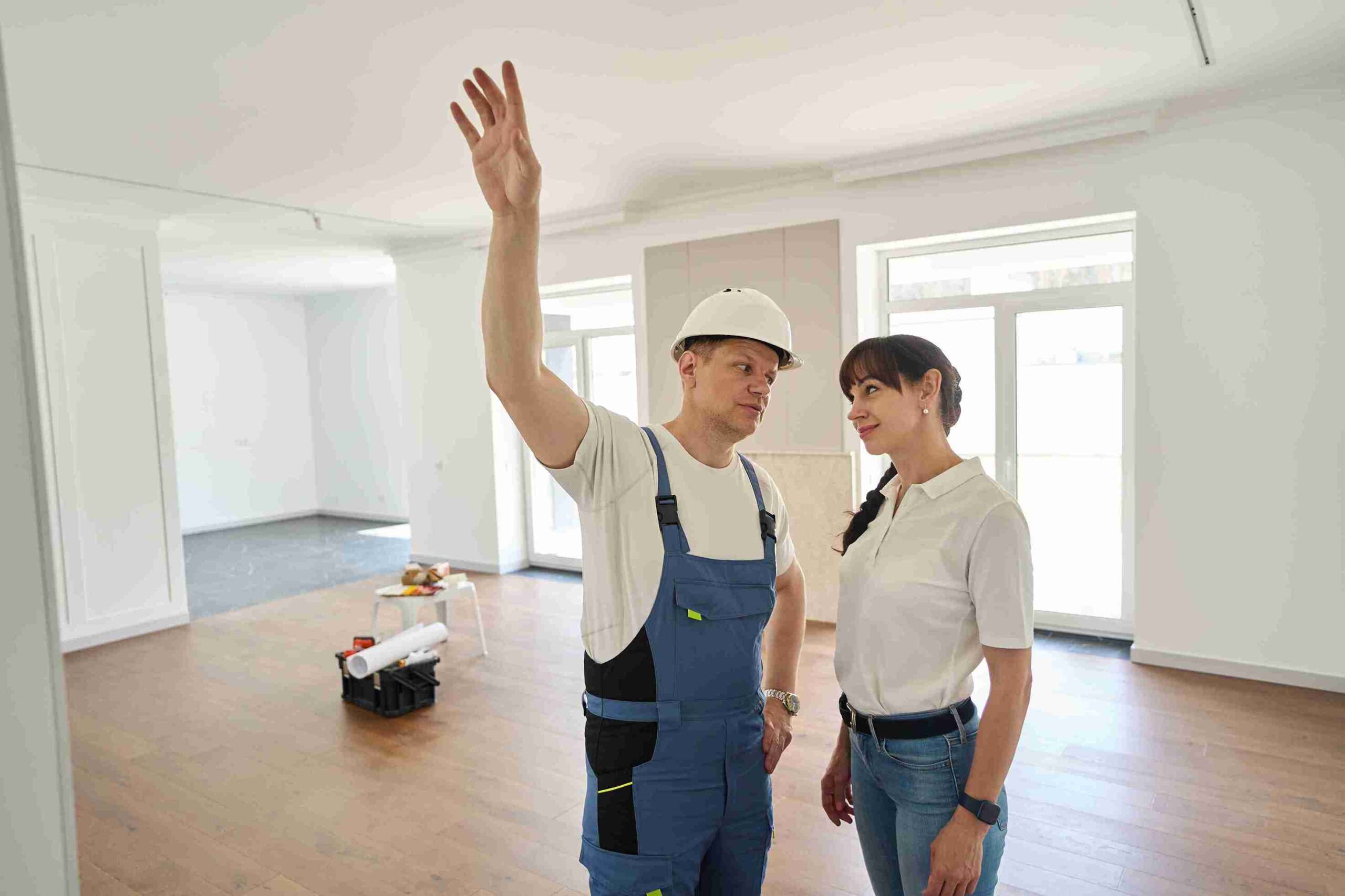 Inspector reviewing HUD NSPIRE standards with property manager during multifamily inspection